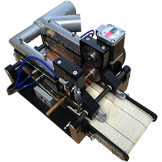 Accessorio trascinatore automatico di lastra per la marcatrice laser RR Writer di Orotig.