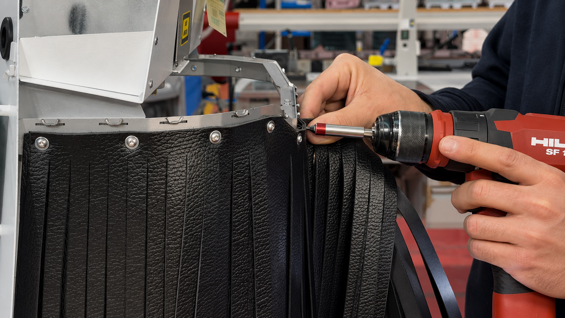 Installation of protective curtains on an Orotig laser welding machine